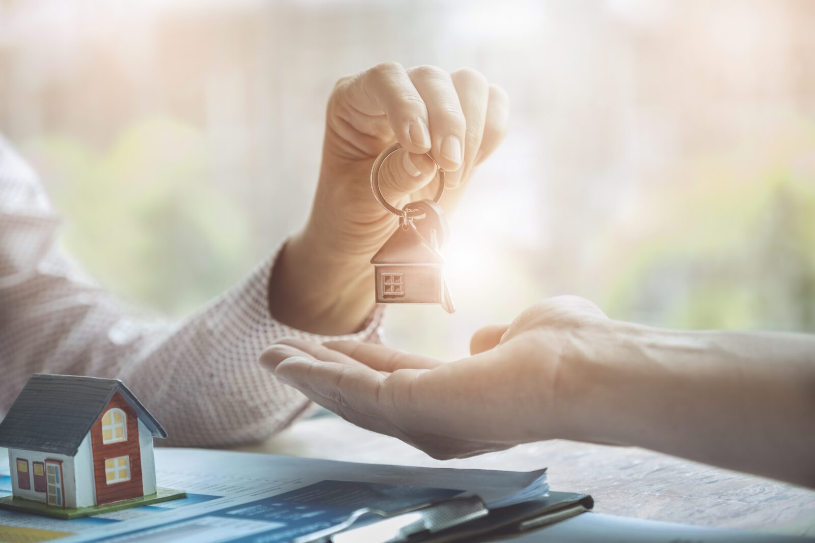 Real estate agent showing a home to potential buyers