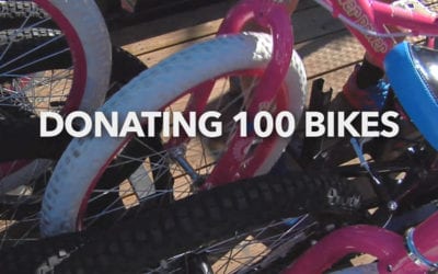100 Homes Sold, 100 Bikes Donated