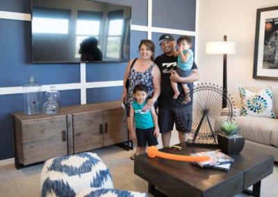 a family in their new home at Sky Canyon